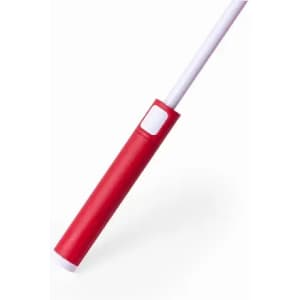 A red handle and white stick feature a button, likely part of a promotional product.