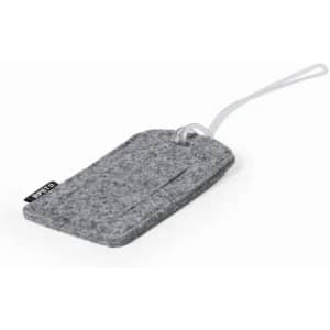 A grey felt luggage tag with a clear strap and a branding logo.