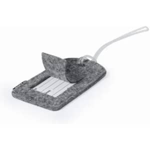 A grey felt luggage tag with a transparent pocket for information and a loop for attachment.