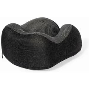 A travel pillow in black with a contoured shape and textured fabric, designed for comfort and support.