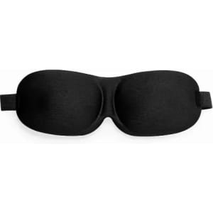 A sleep mask in black with a smooth surface and adjustable straps. Features a contoured design for comfort.