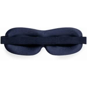 A sleep mask in navy blue, featuring a curved design and an adjustable strap for comfort.