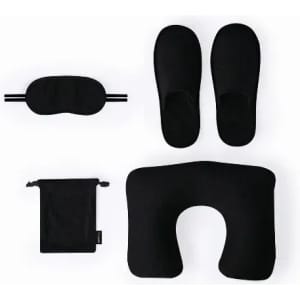 A travel set featuring black slippers, an eye mask, a neck pillow, and a pouch for storage.