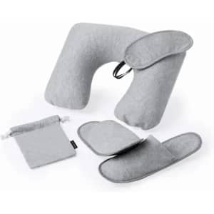 A travel pillow set in grey, including a neck pillow, eye mask, and slippers, alongside a storage pouch.
