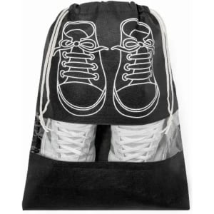 A drawstring bag in black with a shoe print design on the front and a transparent panel at the bottom showcasing white sneakers.