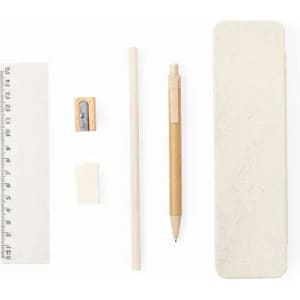 A set of stationery items including a wooden pencil, ruler, sharpener, eraser, and a white flexible eraser on a light background.
