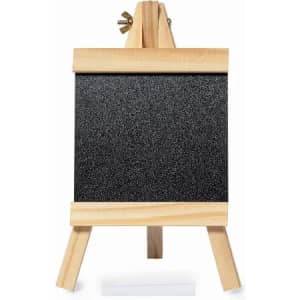 A small black chalkboard with a wooden frame and easel stand. It is blank and ready for writing or drawing.