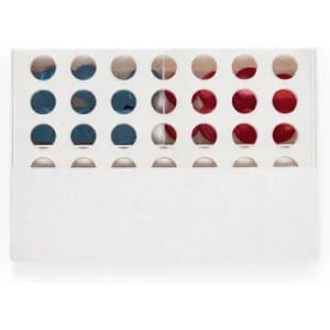 A product packaging featuring a grid with red and blue items visible through round cutouts. It has a logo on the front.