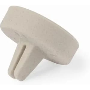 A grey drink bottle stopper with a two-pronged design and a textured surface. It features a subtle speckled pattern.