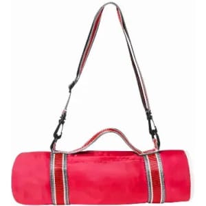 A pink carry bag features a long strap and striped detailing, designed for easy transport. It has a branding logo.