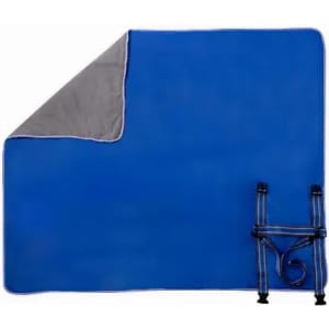 A blue picnic blanket with a grey underside, featuring straps for easy storage. It has a logo in one corner.