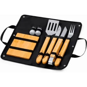 A barbecue tool set featuring bamboo handles, including a spatula, fork, knife, and grilling stones, in a black case.