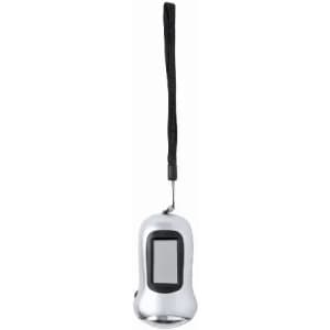 A silver digital counting device with a display screen and a black wrist strap.