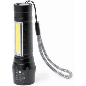A portable black torch with a silver handle and a wrist strap, featuring a bright LED light.