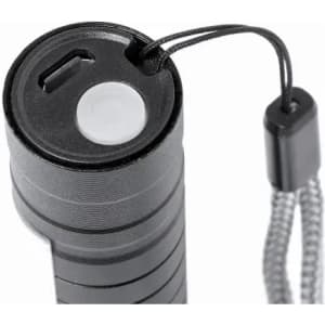 A black flashlight with a circular top featuring a charging port and a lanyard attachment.
