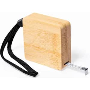 A measuring tape with a bamboo casing and a black strap, featuring a silver measuring tape inside.