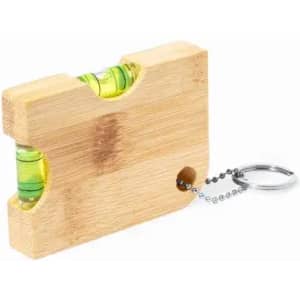 A small bamboo spirit level with yellow vials, attached to a keyring chain.