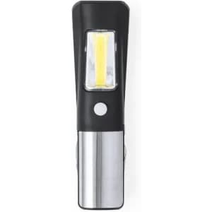 A portable work light with a black plastic body and a silver metal base, featuring a LED light panel.