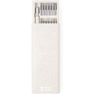 A pen set contained in a light beige case, featuring multiple interchangeable pen tips and a branding logo.