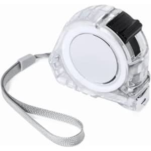 A tape measure with a transparent casing, black accents, and a silver measuring tape. It features a wrist strap.