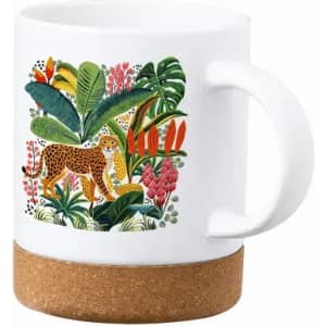 A drink mug featuring a leopard and tropical foliage design, with a cork base and a white ceramic body.