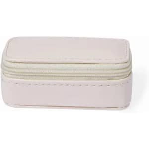 A small rectangular storage case in soft pink, featuring a zip closure and contrasting cream lining.