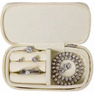 A jewellery case containing a bracelet, two rings, and a pair of earrings, all in silver tones.