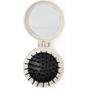 A compact mirror with a round hair brush, featuring a black bristle design and a simple natural-coloured casing.