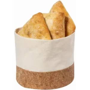 A container with a cork base holding several golden-brown pastries. The container is cream-coloured.