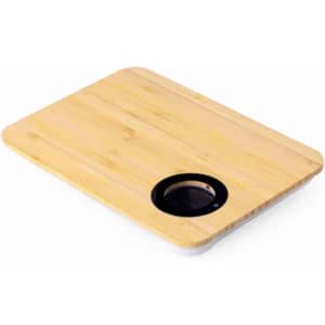 A bamboo cutting board featuring a round black section, ideal for food preparation.