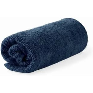 A rolled navy blue towel with a soft, plush texture.