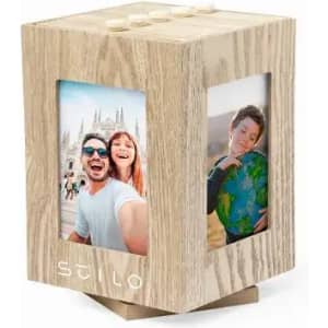 A photo cube display in light wood featuring four frames for displaying pictures. It has a modern design and a logo.
