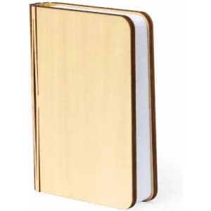A wooden notebook with a natural finish and blank white pages, secured with a simple binding.