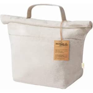 A storage bag made from recycled cotton with a handle, featuring a neutral cream colour and a tag.