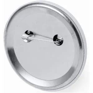 A metal badge with a shiny silver finish and a pin fastening at the back.
