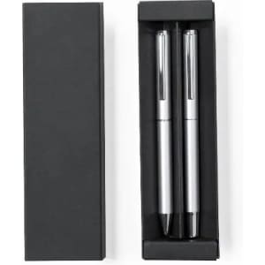 A pen set in a black gift box, featuring two sleek silver pens with black accents.