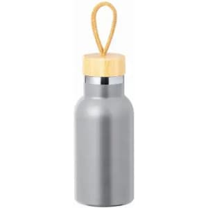 A drink bottle in grey with a bamboo lid and a rope loop for carrying. It features a logo on the surface.