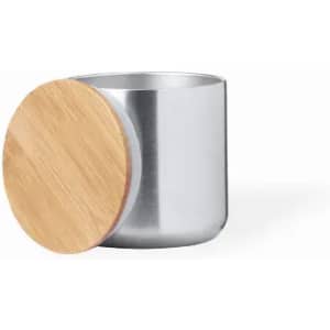 A drink bottle with a shiny silver body and a bamboo lid. It features a simple, modern design.