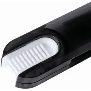 A toothbrush with a sleek black handle and a white brushing head, featuring a logo on the side.