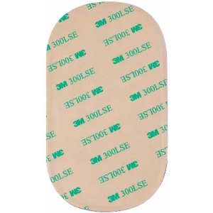 A skin-coloured adhesive patch with a smooth surface, featuring green branding on a beige background.