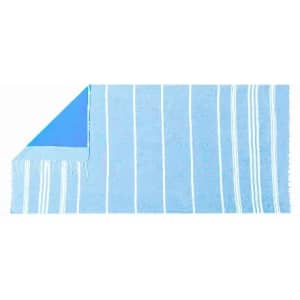 A towel featuring blue stripes and a solid blue corner, with fringed edges. It has a logo in one corner.