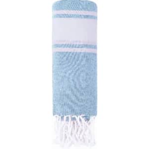 A towel in light blue with white stripes and fringed edges, featuring a simple design and soft texture.