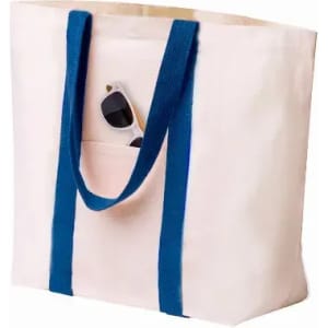 A tote bag in light pink with dark blue straps, featuring a front pocket and sunglasses peeking out.