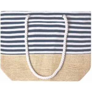 A tote bag featuring navy and white stripes with a natural jute bottom and thick rope handles.