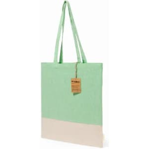 A tote bag in mint green with a cream bottom, featuring two shoulder straps and a tag attached.