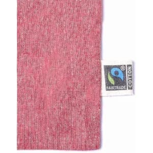 A pink fabric swatch with a Fairtrade label attached on one side.