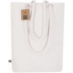 A tote bag in white with rope handles, featuring a tag and a logo. The bag has a simple, clean design.