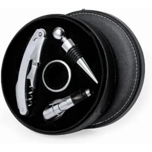 A wine accessory set in a round black case, featuring a corkscrew, stopper, pourer, and ring, all with a silver finish.