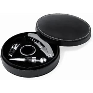 A bottle opener and wine accessories set in a round black box with a textured lid. The items are silver and black.