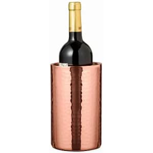 A drink bottle in a shiny copper wine cooler, featuring a textured exterior and a bottle of red wine inside.